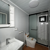 Bureau préfabriqué à faible coût écologique à distance pliable paquet plat 2 chambres à coucher 40ft maison conteneur extensible avec salle de bain cuisine