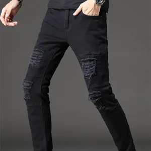 Heißer Verkauf niedriger Preis Herren einfarbige Jeans hose koreanischer Stil zerrissene schlanke mittel hohe Jeans hose für Männer