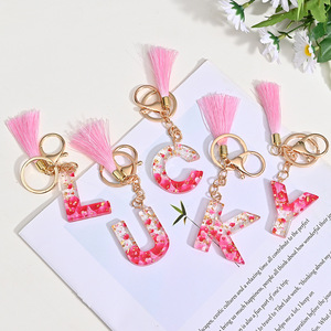 <span class=keywords><strong>Porte</strong></span>-clés en plastique à paillettes avec pendentif en résine et <span class=keywords><strong>lettre</strong></span>, vente chaude - Product Image 1