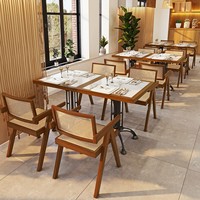 Ensemble de table à manger en ardoise avec structure métallique, style américain rétro, chaises en rotin et bois massif, mobilier de restaurant commercial de luxe