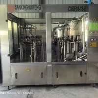 Machine de remplissage automatique de bouteilles en verre pour boissons, eau, jus, thé, miel, sirop, huile de cuisson, ligne de production de remplissage à chaud et de bouchage