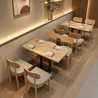 Ensemble de table et banquette en forme de U, gris taupe, banquette à nervures, chaise à dossier anneau, table à base conique pour cour, hall et terrasse de café
