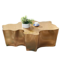 Table basse en acier inoxydable à grain de bois de luxe, surface miroir, forme irrégulière, design de souche, options de couleur or et argent pour salon