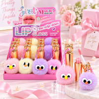 Huile à lèvres en tube métallique doré, brillant à lèvres avec porte-clés pompon oiseau mignon, fabrication OEM personnalisée