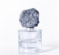 Flacon pulvérisateur de parfum en verre transparent cylindrique de 50 ml, avec pompe à pression à sertir, couvercle rétro en pierre brute, personnalisable avec logo, pour vente en gros