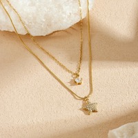 Collier double couche chic avec pendentif cœur et étoile en zircon pavé étincelant, chaîne irrégulière, bijoux haut de gamme pour femmes en gros TGXL14809