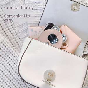 Masseur facial portable avec écran numérique - 3 niveaux de chaleur et longue durée de vie de la batterie - Product Image 5