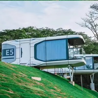 Maison capsule modulaire portable en acier personnalisée avec cuisine et salle de bain, villa préfabriquée intelligente et design moderne pour usage commercial
