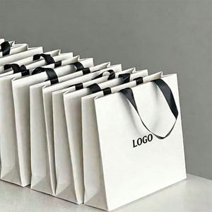 Wholesale Custom White Paper Shopping Bag With Black <b>Ribbon</b> Handle Ideal for Apparel Retail & Takeaway Packaging - Product Image 2