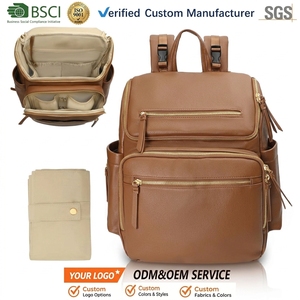 <span class=keywords><strong>Sac</strong></span> <span class=keywords><strong>à</strong></span> couches en cuir <span class=keywords><strong>sac</strong></span> <span class=keywords><strong>à</strong></span> dos <span class=keywords><strong>avec</strong></span> pochettes de rangement matelas <span class=keywords><strong>à</strong></span> <span class=keywords><strong>langer</strong></span> sangles de poussette et 4 poches isolées grand <span class=keywords><strong>sac</strong></span> <span class=keywords><strong>à</strong></span> couches pour bébé - Product Image 1