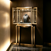 Vitrine à bijoux de luxe en métal doré avec éclairage LED, présentoir à bijoux en verre, meuble de présentation pour boutique de bijoux