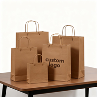 Vente chaude Sacs cadeaux en papier kraft avec logo personnalisé, cartes en carton argenté, carton ivoire pour vêtements, shopping, bijoux, montres