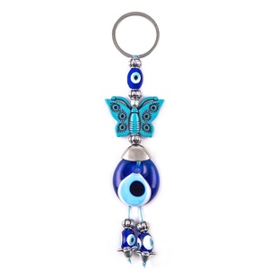 Llavero de Cristal Hecho a Mano con Cuentas de Ojo Turco en Forma de Mariposa Turquesa, Hecho en Turquía - Product Image 1