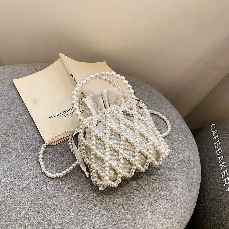Vente en gros en usine de pochette perlée de luxe pour femmes sacs de soirée en perles à bandoulière