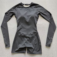 Combinaison de sport pour femme à manches longues et dos ouvert, avec coutures froncées invisibles, idéale pour le yoga et l'entraînement