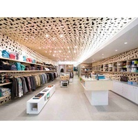Aménagement de magasins de mode, table d'exposition de vêtements sur mesure, présentoir de vêtements pour magasin, fournisseur en gros