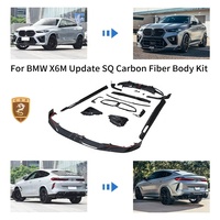 Kit de carrocería de fibra de carbono seca estilo SQ para BMW X6M F96: Labio delantero, rejillas de ventilación OEM, faldones laterales, difusor trasero, alerón de techo y molduras de guardabarros.