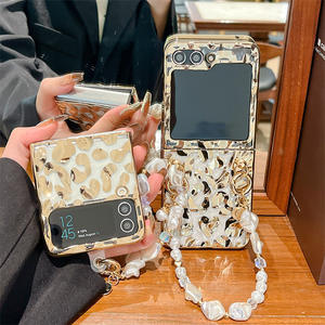 เคสโทรศัพท์มือถือ Samsung Galaxy Z Flip 7/6/5/4/3 รุ่นลายเสือดาวจีบ  แบบเคลือบไฟฟ้า  วัสดุ PC คุณภาพสูง ป้องกันอย่างดี - Product Image 1