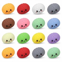 Jouet à pincer amusant en forme de boule avec expression de dessin animé, en sachet