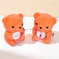 Boîte à bijoux ours rotative orange brillante avec rose éternelle surprise à 360°, emballage cadeau personnalisé avec logo pour la Saint-Valentin