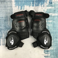 SK-652 Equipo a prueba de golpes para motociclismo, rodilleras profesionales con deslizador para carreras de carretera y motocross, funda de PP y almohadilla gruesa de EVA