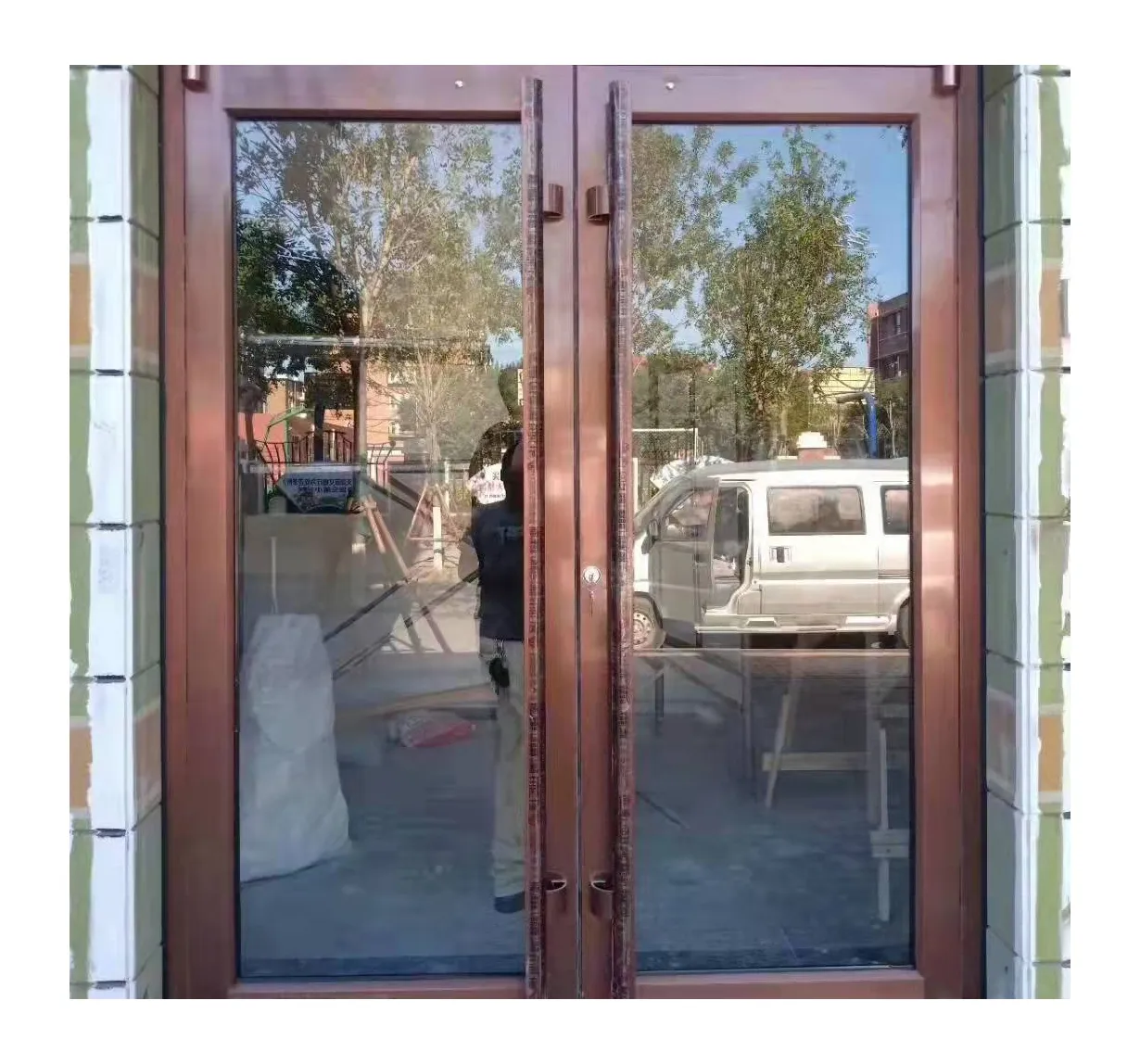 Broken bridge aluminum supermarket put hurricane KFC entrance door commercial storefront glass door