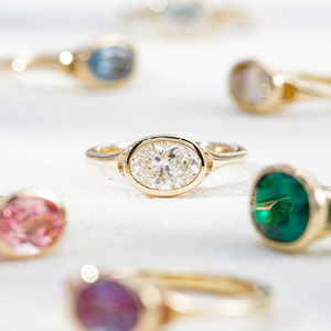 แหวนหมั้นทองคำแท้ 9K 10K 14K 18K สีขาว สีเหลือง สีโรสโกลด์ ประดับเพชรแล็บโกรว์ 1 กะรัต D VS1 รูปไข่ ทรงเบเซลเซ็ต - Product Image 1