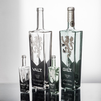 Botol Kaca Persegi Pipih Unik 700ml 50ml dari Pemasok Cina untuk Minuman Keras Tequila Brandy Anggur dengan Sistem Penutup Gabus, Sablon, dan Dekal Frost