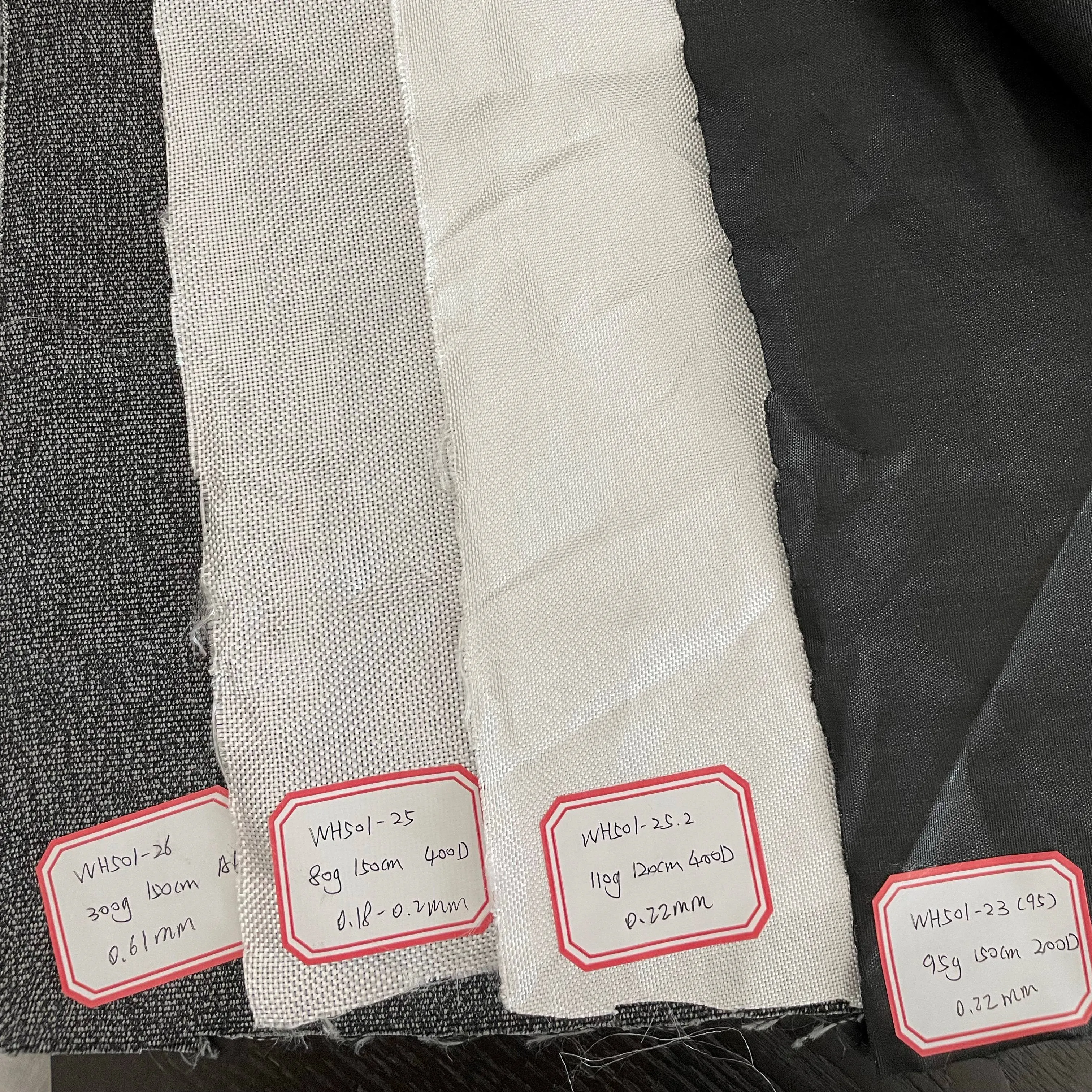 Fabricant de tissu léger à haut niveau anti-coupure UHMWPE blanc noir pour tissu résistant aux coupures