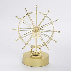 Yuling máquina de movimento perpétuo ornamentos girando casa europeia sala de estar decorações de metal roda gigante dourada