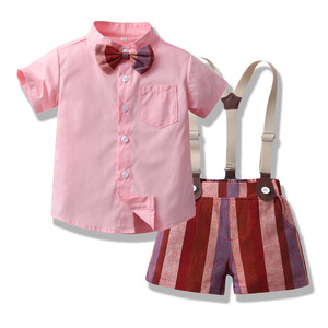 Conjunto de ropa de estilo moderno transfronterizo para niños mayores, <span class=keywords><strong>Camisa</strong></span> de algodón con lazo de manga corta de verano, conjunto de pantalones cortos a rayas con <span class=keywords><strong>tirantes</strong></span> - Product Image 4