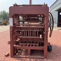 Machine automatique de fabrication de blocs de ciment QT4-15 pour petites entreprises, machine à fabriquer des briques de pavage autobloquantes