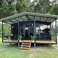 Maison conteneur personnalisable avec porche et toit incliné, en acier durable, pour usage en entrepôt, bureau ou bâtiment de jardin, résistante au feu