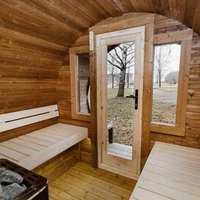 Robuste Outdoor-Gartensauna für 4 Personen Traditionelle Finnische Runde Sauna mit Asphaltschindeln