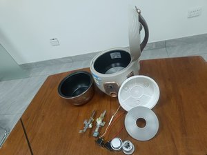 Mini-cuiseur à riz portable en promotion, capacité 0,6-1,5 L, cuve en aluminium avec tasse graduée et cuiseur vapeur, appareil électroménager multifonctionnel - Product Image 6