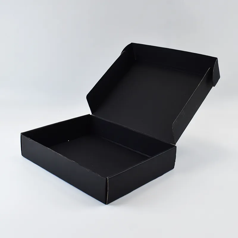 Boîtes d'expédition ondulées noires uniques imprimées, boîte postale en carton avec Logo personnalisé avec plateau Eva, vente en gros