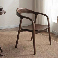 Fauteuil de salle à manger BST moderne en noyer foncé avec dossier arqué et assise rembourrée en cuir beige pour hôtel