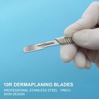 # Lames de scalpel chirurgical 10R en acier au carbone stériles jetables à bord arrondi pour le dermaplaning facial, les salons de beauté et de spa, 100 pièces