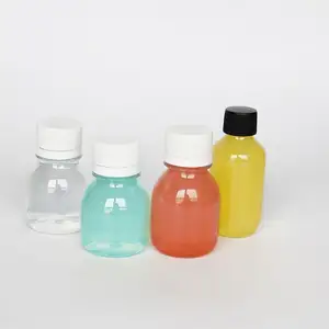 ขายส่ง booster energy shot-ขวดน้ำสำหรับดื่มน้ำผลไม้เกรด2ออนซ์60มล.,ฝาเกลียวพลาสติกเปล่าทรงกลมขนาดเล็กปราศจากสาร BPA