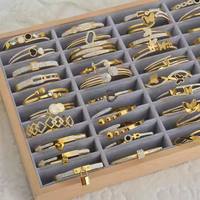 Accessoires de bijouterie Zircon plaqué or 18 carats Vente en gros en vrac Bracelet en acier inoxydable