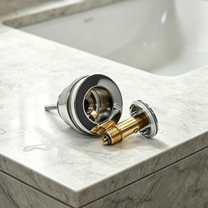 Valvola di scarico a scomparsa in ottone cromato per lavabo, con pulsante a scatto, G1 1/4, tappo da 63mm, asta in acciaio inossidabile, molla anti-odore - Product Image 2