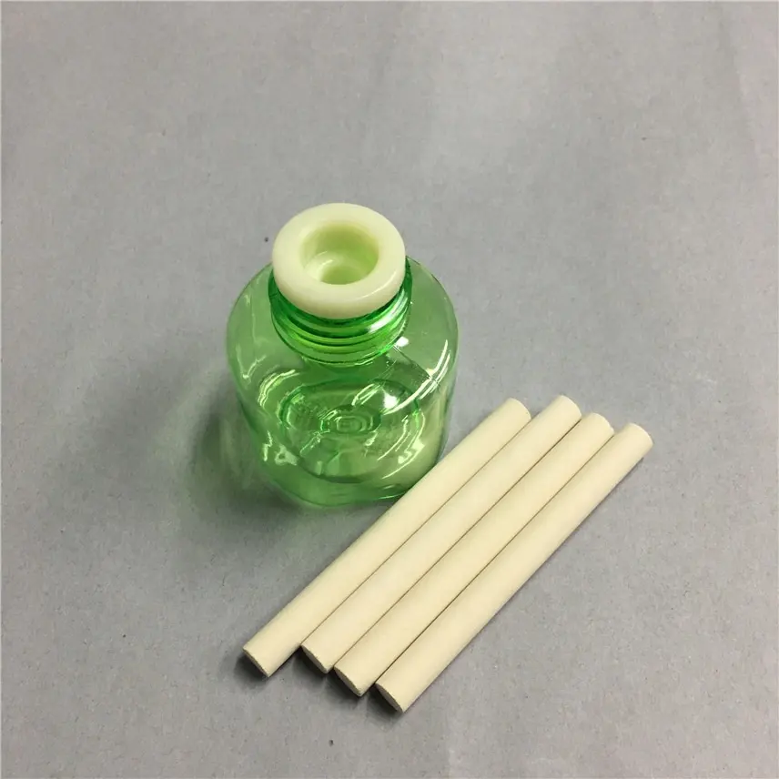 Porous ceramic wick with mosquito repellent liquid refill bottle