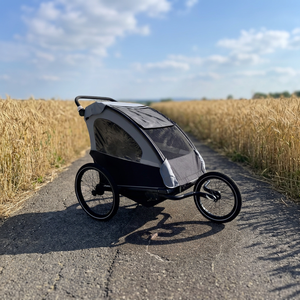 Remorques pour enfants en alliage d'aluminium avec suspension indépendante, charge utile maximale de 35 kg, adaptées aux vélos jusqu'à 30 pouces et attelage à dégagement rapide - Product Image 1