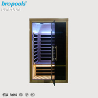 Sauna infrarouge lointain moderne pour 2 personnes en bois de pruche avec contrôle intelligent Wi-Fi et verre noir pour la relaxation, le spa et le bien-être à domicile