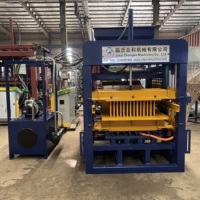 Équipement de fabrication de briques en béton QT4-15B avec système hydraulique contrôlé par PLC pour usine de pavés creux et de blocs pleins