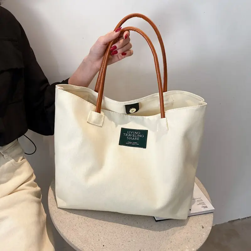 कैनवास दुकानदार कैजुअल फोल्ड पैकेज उच्च गुणवत्ता वाली महिलाओं को फिर से उपयोग करने योग्य बड़ी क्षमता की किताबें महिलाओं के कंधे बैग बैग