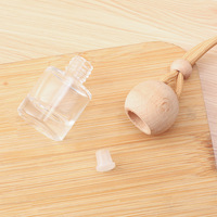Conception de luxe vide 8ml forme ronde bouteille de parfum de voiture désodorisant de voiture suspendu pour diffuseur de parfum d'huiles essentielles