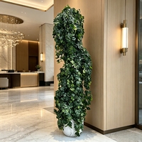 Grandes plantes artificielles à feuillage tombant avec pot en marbre pour la décoration de hall d'hôtel moderne et de salle d'exposition de meubles