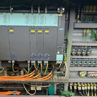 Centre d'usinage à commande numérique allemand DMG Mori DMU50 à 5 axes, utilisé pour le finissage de composants de précision de petite taille.