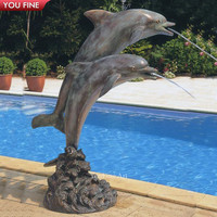 Statue de dauphin en bronze pour piscine extérieure